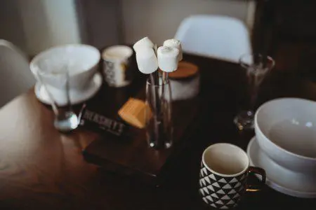 Coffee maker, kettle, and cups on wooden counter in a Fairbanks Alaska treehouse kitchen