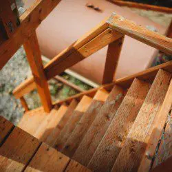 Wooden staircase leading down from a treehouse in Fairbanks, Alaska