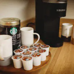 Keurig coffee setup with Starbucks hot cocoa, mugs, and K-cups in a Fairbanks Alaska vacation rental kitchen