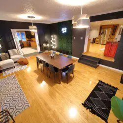 Warm lodge entrance with bar, seating area, and dining room in Fairbanks, Alaska.