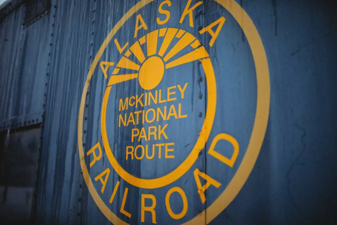 Snow-covered Alaska Railroad car lodge stay in Fairbanks adventure setting.