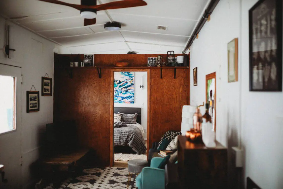 Modern living space inside restored railcar at Alaska adventure lodge in Fairbanks.