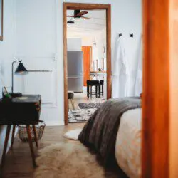 View from bedroom through cozy railcar interior at Alaska adventure lodge in Fairbanks.