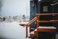 Snowy forest view beside Alaska Railroad lodge stay in Fairbanks, Alaska.