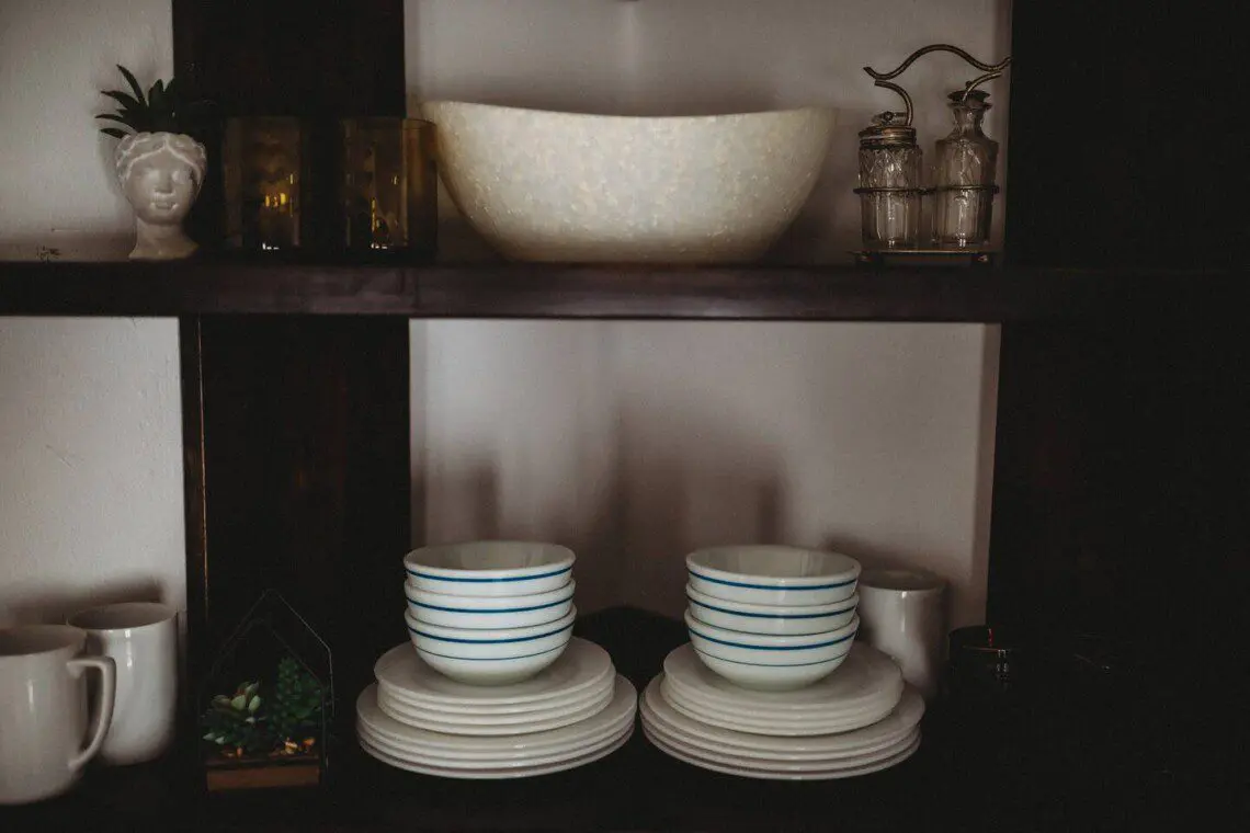 Keurig coffee maker with glass carafe on a wooden counter in a Fairbanks Alaska lodge rental