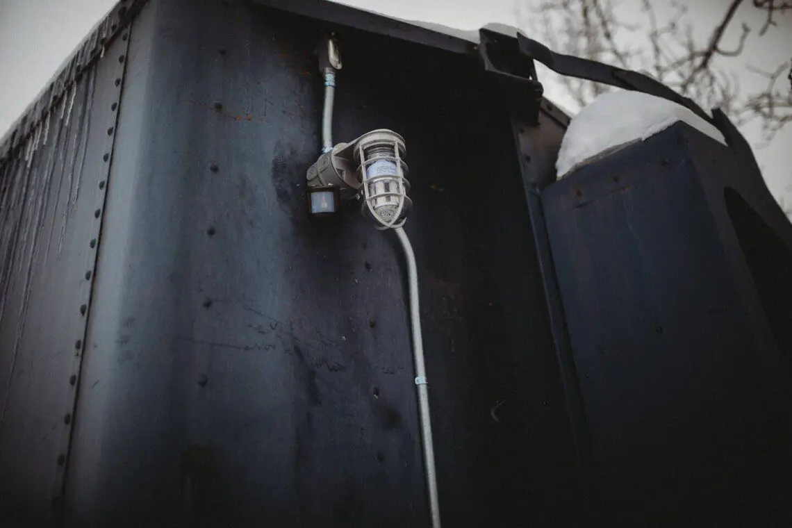 Snowy forest view beside Alaska Railroad lodge stay in Fairbanks, Alaska.