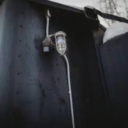 Snowy forest view beside Alaska Railroad lodge stay in Fairbanks, Alaska.