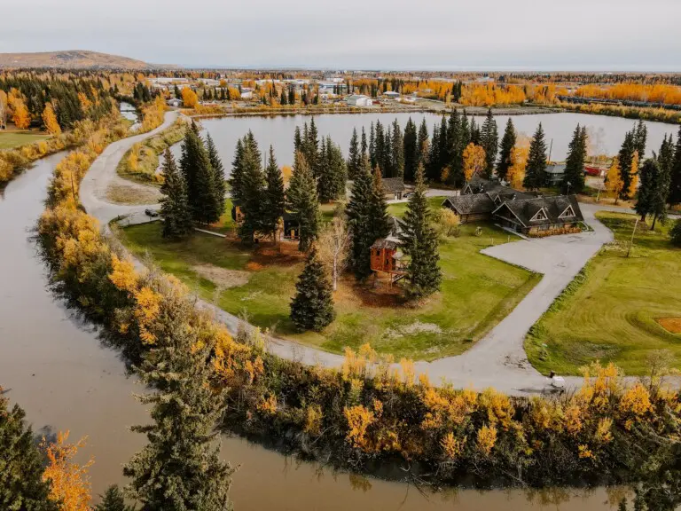 Alaska adventure lodge with treehouse rentals in Fairbanks — a unique place to stay and top wedding venue by the river.